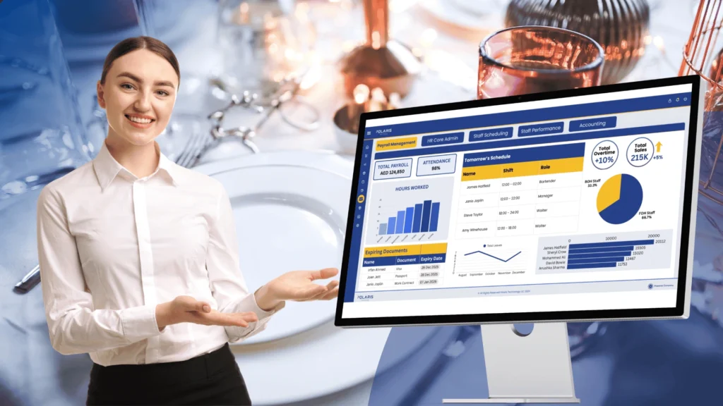 Restaurant setting, staff pointing to Polaris ERP's HR and Payroll system